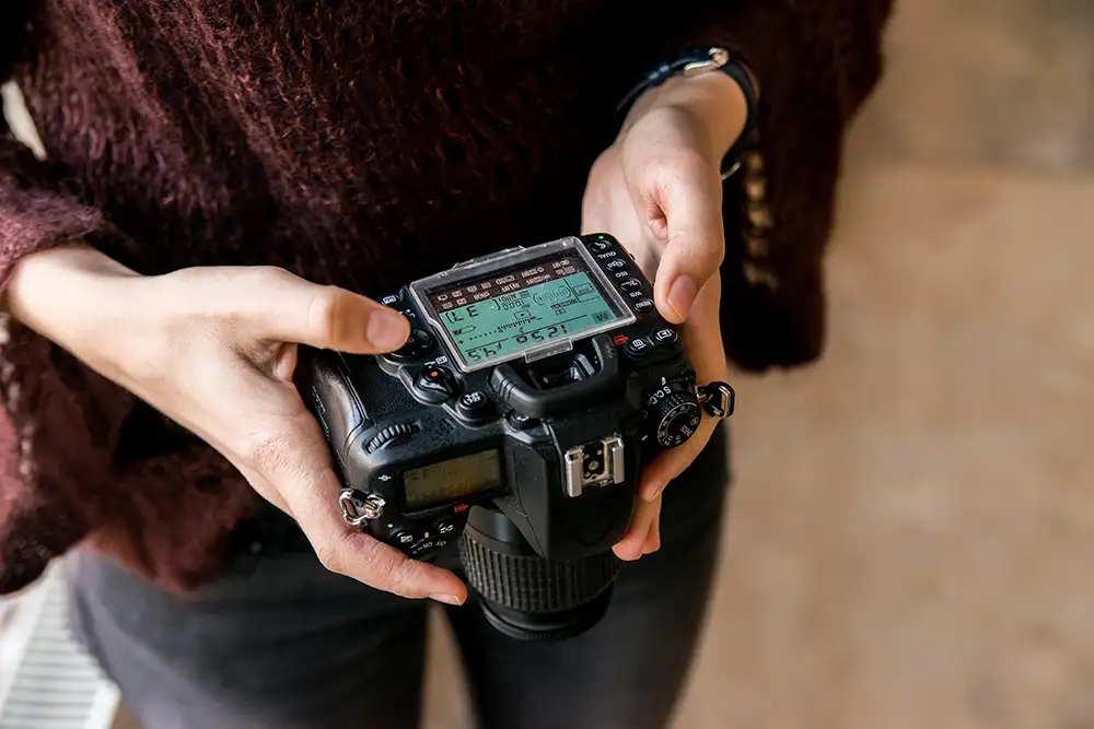 woman holding camera